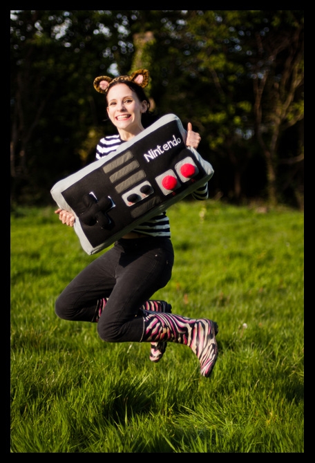 Lucy Sparrow and a Nintendo cushion (photo taken from http://www.feltsewgood.com/shop/nintendo-entertainment-system-controller-cushion/)
