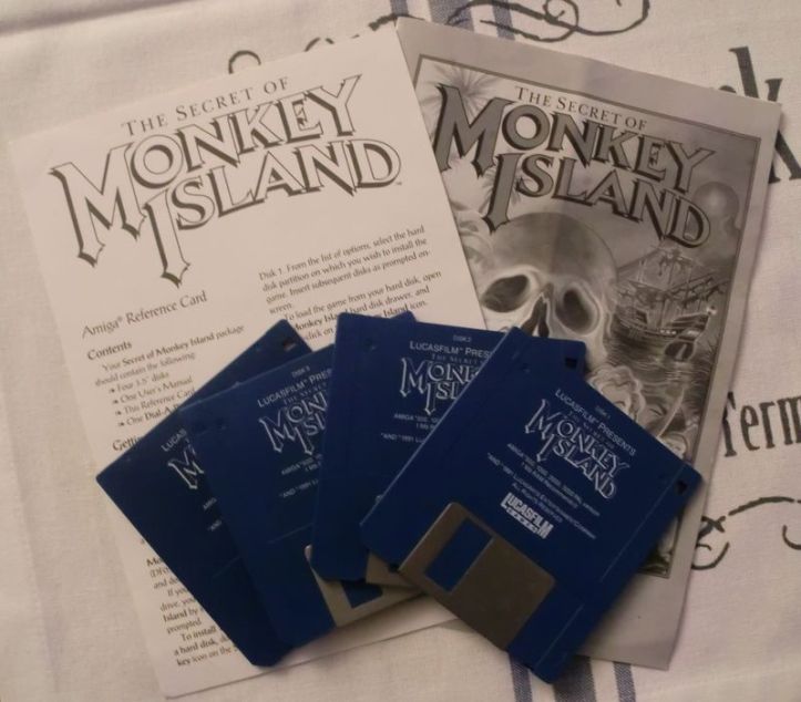 Paperwork and floppies! (photo by Old School Game Blog)